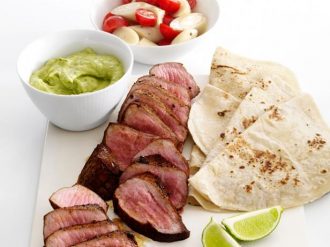 Steak with Avocado Sauce and Tomato Salad